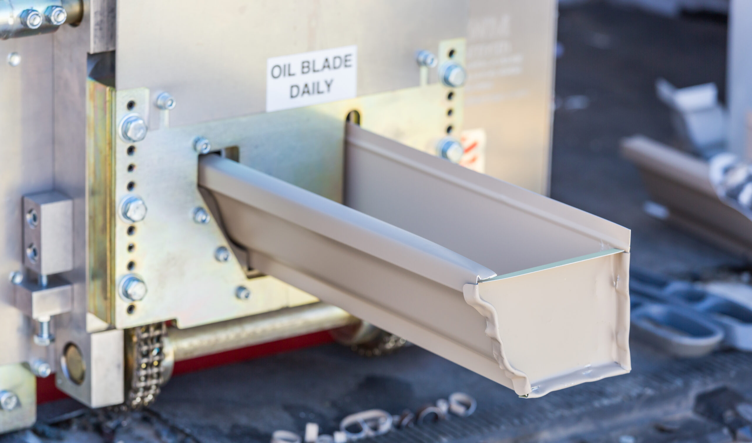 Close-up of a seamless gutter forming machine