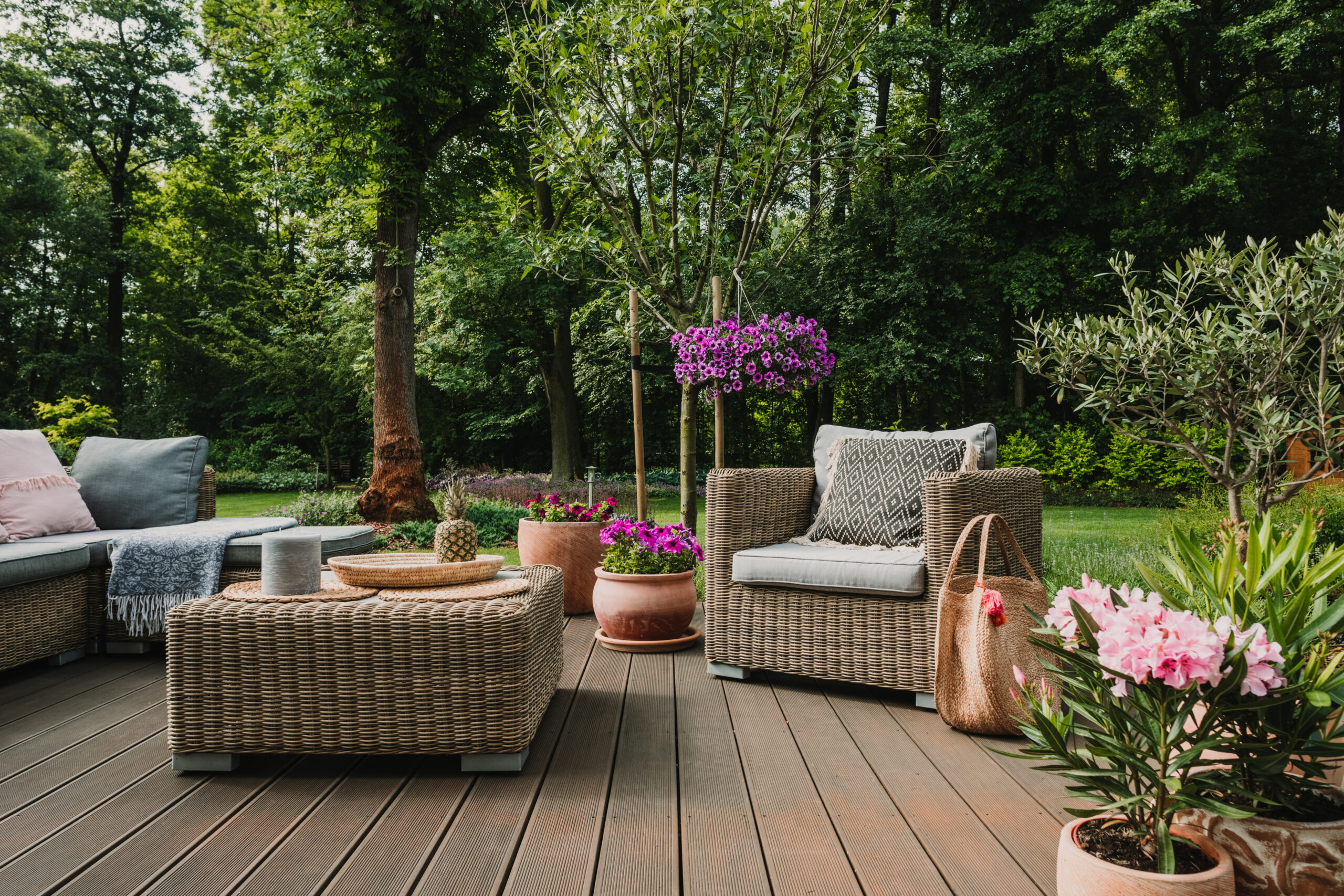 A cozy outdoor patio with wicker furniture